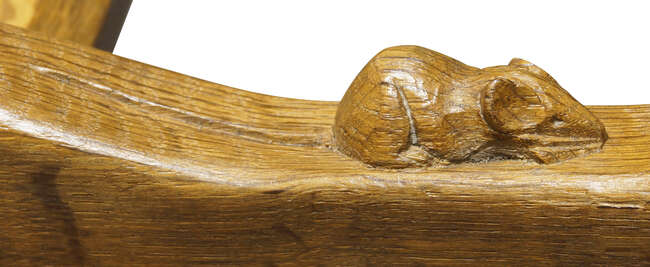 
	
		Robert Thompson (1876-1955), a Mouseman English oak three-legged stool
		c.1970, signed...