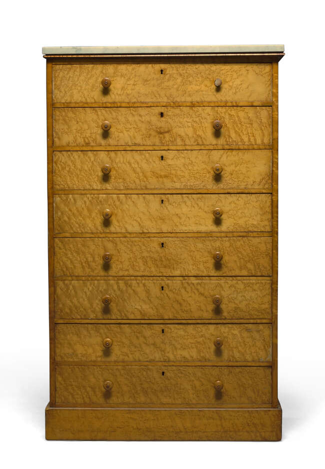
	
		A Victorian birds eye maple chest of drawers, with rectangular white marble top above...