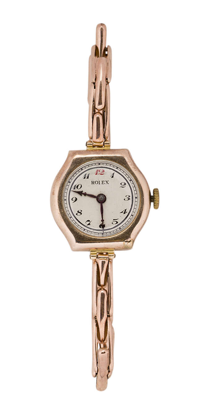 
	
		A lady&#39;s 9ct. gold wristwatch, by Rolex, the silvered dial with Arabic numerals with red...