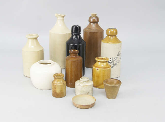 
	
		A Bourne Denby salt glazed stone ware bottle, impressed with the name Josiah Russell,...