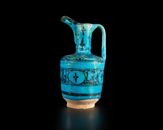 A mallet black and turquoise blue glazed pottery ewer, Ilkhanid central Iran, 12th/13th century,...