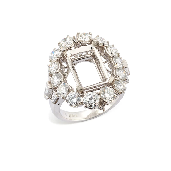 A diamond set ring mount, composed of a central rectangular-shaped vacant collet within...