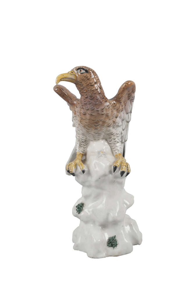 
	
		A European porcelain model of an eagle, in the Meissen style, after a model by J.J....