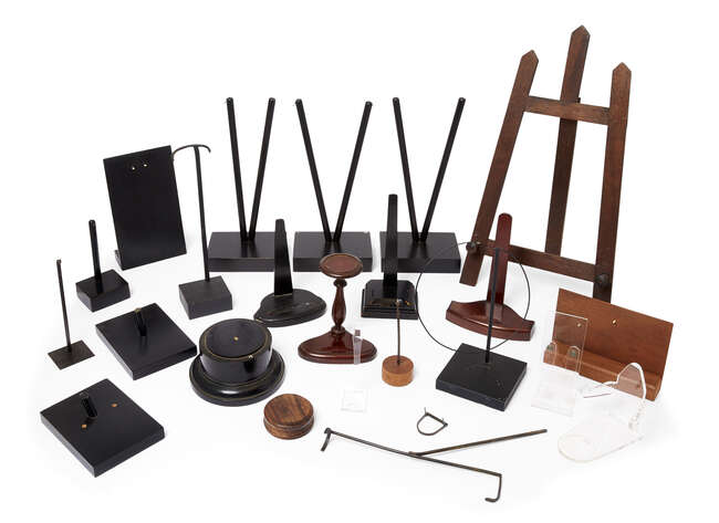 
	
		A group of twenty three exhibition display stands, 20th/21st century, of various shapes...