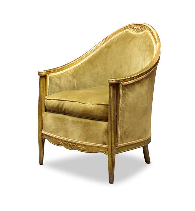 French Art Deco, a giltwood upholstered bergère
c.1930
The curved top rail and apron carved...