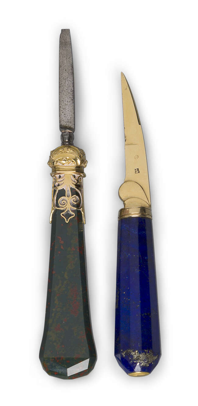 
	
		Two hardstone manicure knives, late 19th century, one with lapis lazuli faceted tapering...