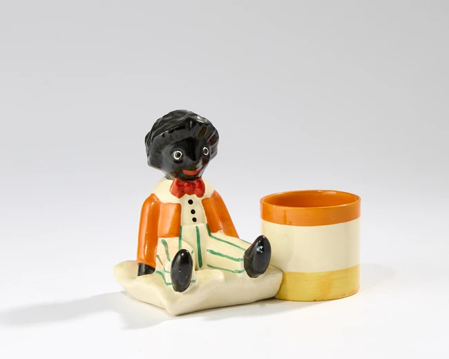Clarice Cliff Figural pen pot, circa 1930 Glazed ceramic Printed manufacturer's marks 14.5cm...