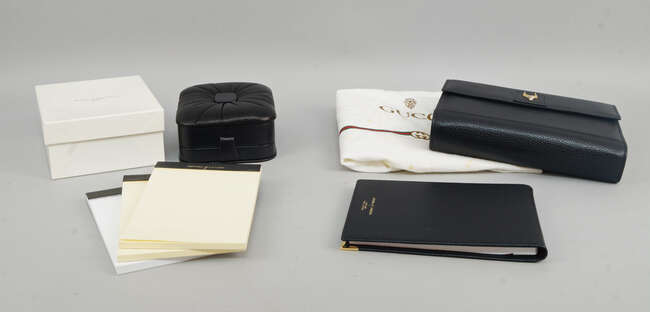 
	
		A Gucci Filofax, 1990, boxed and unused, together with an Aspinal of London leather bound...