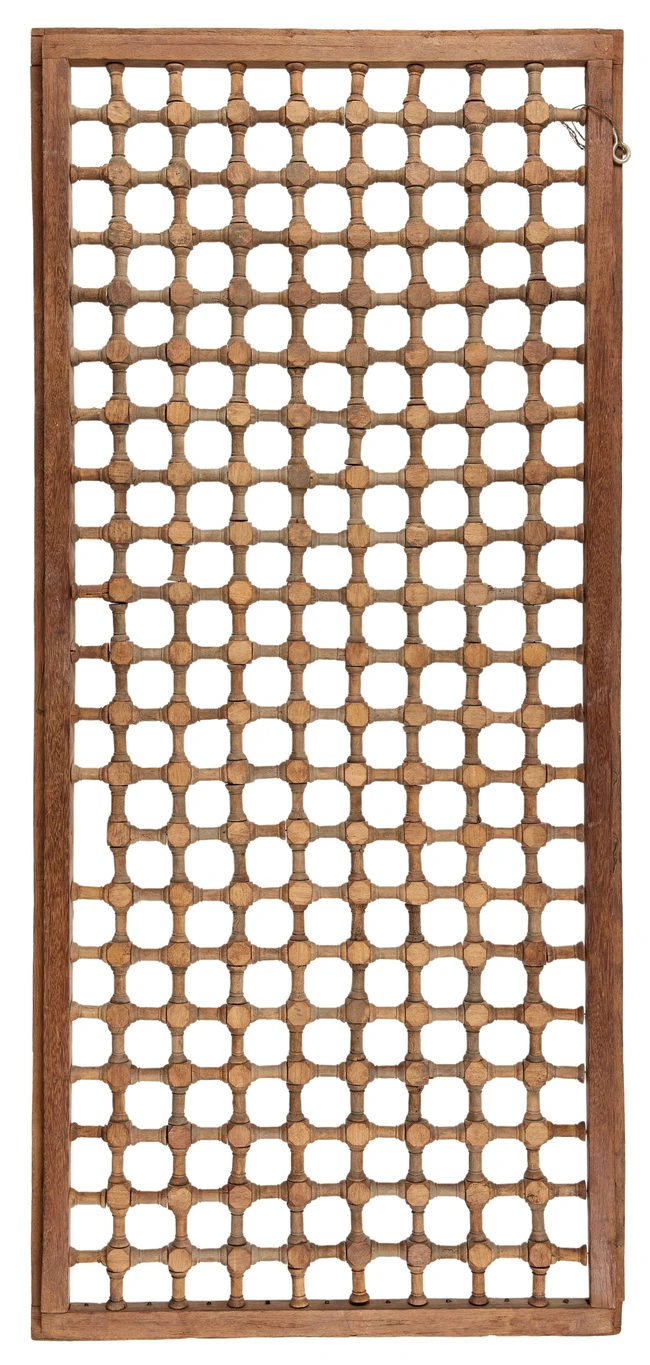A rectangular and latticed carved wood window shutter, Mughal India, 18th century, 
115 x 50cm.