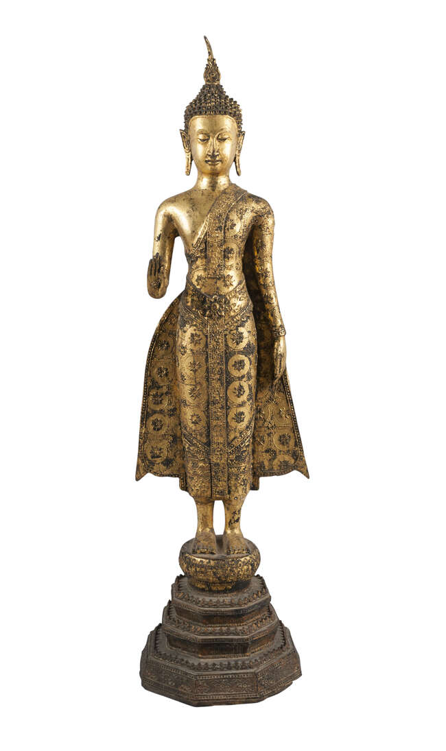 
	
		A Thai gilt copper alloy standing buddha, early 20th century, with right hand in abhaya...