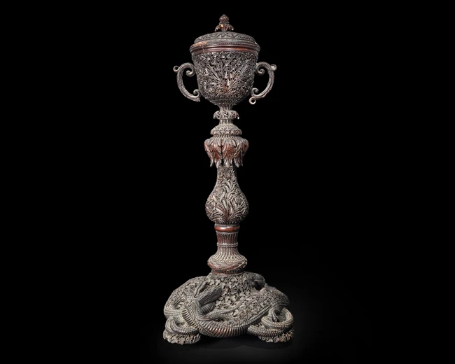 An intricately carved ornamental lidded urn, Gujarat, India, 19th century, 
Possibly from a...