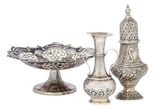 
	
		An Edwardian silver sugar caster, London, c.1901, Sibray, Hall & Co Ltd, repousse...