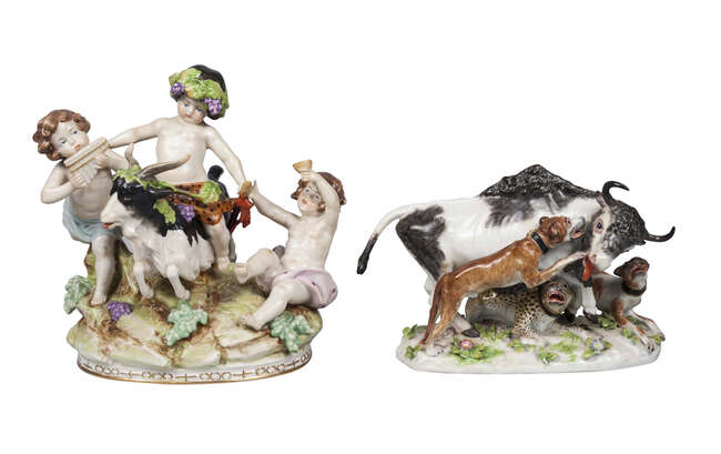 
	
		A Sitzendorf porcelain group of three young bacchanalians central figure riding a goat, ...
