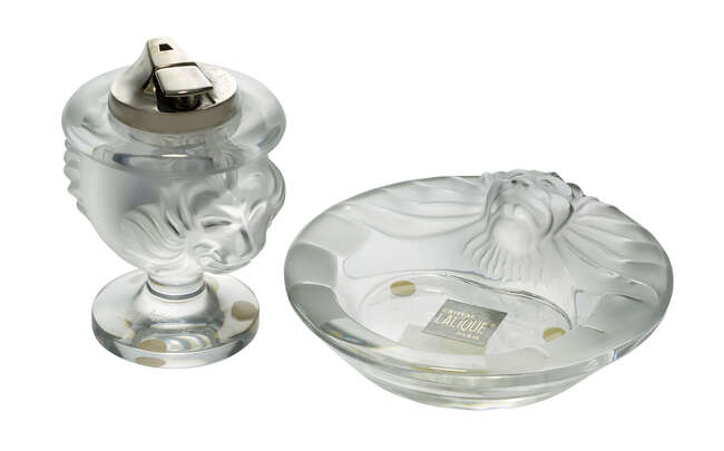 
	
		Lalique, a clear and frosted glass lighter with Ronson mechanism and a matching...