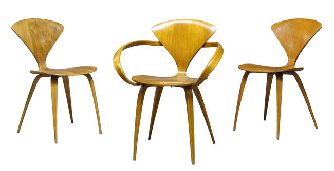 
	
		Norman Cherner (1920-1987), a laminated plywood and walnut Cherner armchair and two...