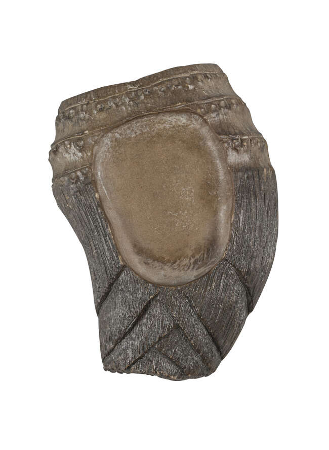 
	
		A Chinese duan ink stone, early 20th century, formed as a bamboo root, 9cm long

	


