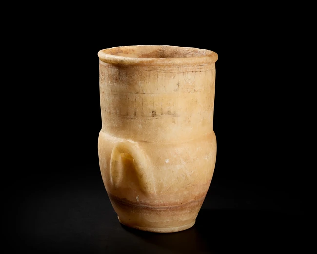 A sizeable Egyptian alabaster vase, New Kingdom, circa 1279-1213 B.C.
with vestigial handles...