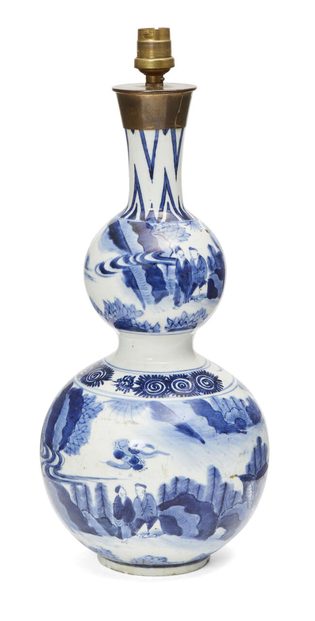 
	
		A Japanese Arita porcelain double gourd vase, 17th century, painted in underglaze blue...