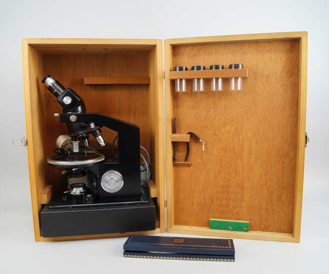 
	
		A Swift and son microscope, in a wooden case

	

