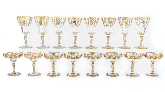 
	
		A suite of Continental cut-glass hosting table wares, in the style of Moser, 20th...