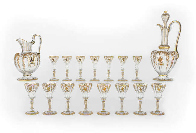 
	
		A suite of Continental cut-glass hosting table wares, in the style of Moser, 20th...
