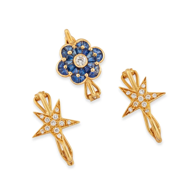 Three gem-set hair slides, one of floral design, set with calibré cut sapphire and a...