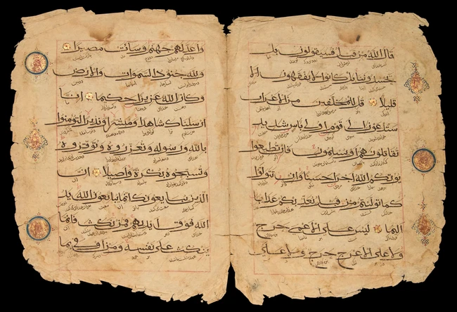 A group of Qur'an folios,Iran 14th-15th century,Arabic manuscript on paper, with 9ll of bold...