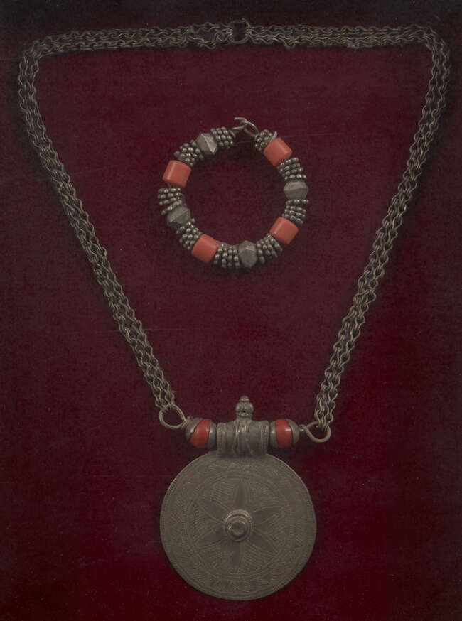 
	
		A coral set silver bracelet and necklace, Afghanistan, early 20th century, within a...
