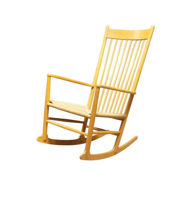 
	
		Hans J. Wegner (1914-2007), a beech model &#39;J16&#39; rocking chair,
		c.1980,
		the spindle...