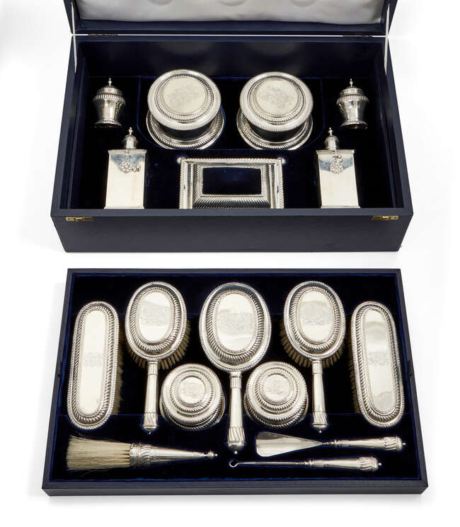 
	
		An impressive George V silver dressing table service, 1927-1932, London, Lionel Alfred...