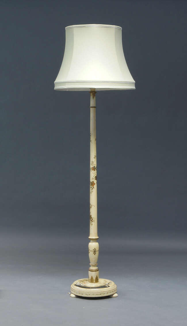 
	
		A Chinoiserie cream painted and parcel gilt standard lamp, late 20th Century, decorated...