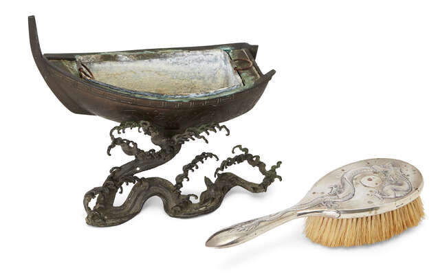 
	
		A Japanese bronze boat-shaped censer, Meiji period, on a wave-form base, 27cm long, and a...