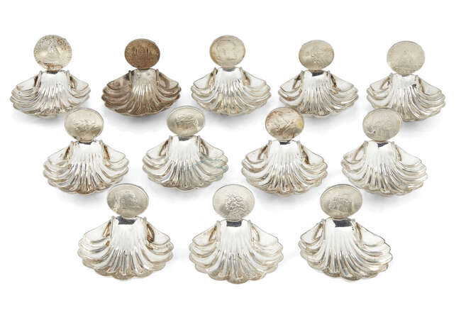 
	
		A cased set of twelve Austrian silver place card holders, Vienna, unknown maker, stamped...
