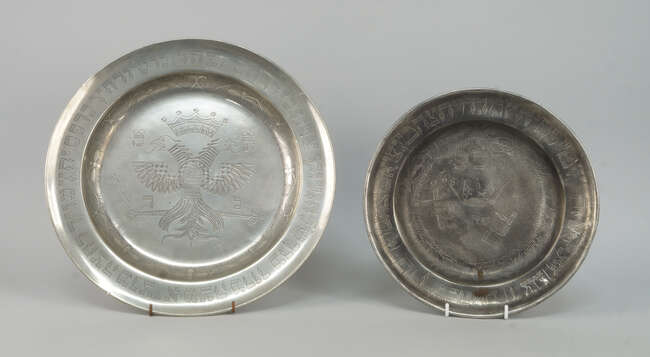 
	
		A Continental pewter charger, with touch marks for C Kramer,  later engraved with a...