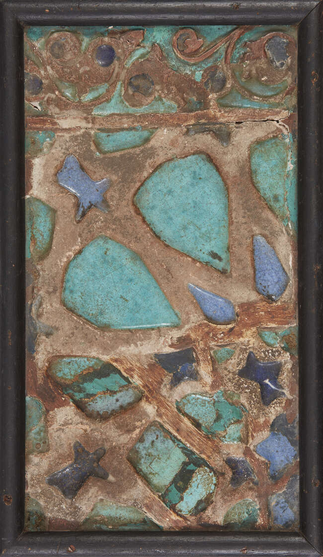 
	
		A turquoise and cobalt glazed cuerda seca pottery tile fragment, Western Iran, 13th...