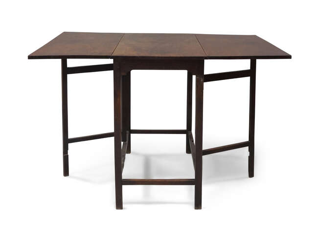 
	
		A George III mahogany drop leaf gate leg table, the square legs joined by stretchers,...