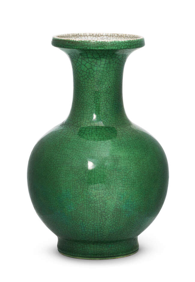 
	
		A Chinese monochrome porcelain vase, 18th/19th century, with allover apple-green glaze...