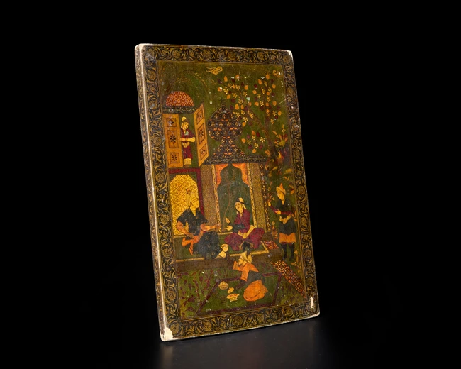 A rectangular lacquered papier-mache mirror case, Qajar Iran, late 19th/early 20th...