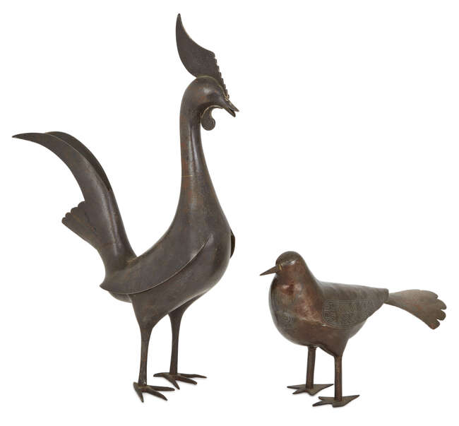 
	
		A Qajar steel cockerel and a dove, Persia, 19th century, both naturalistically modeled in...