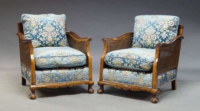 
	
		A mahogany and caned bergere suite, early 20th Century, comprising three seater sofa,...