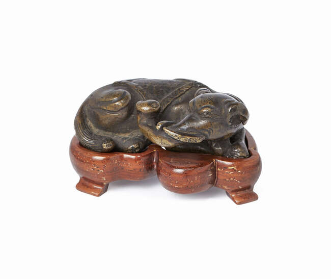 
	
		A Chinese bronze elephant scroll weight, Ming dynasty, 17th century, the elephant...