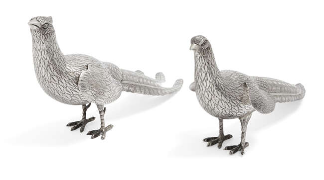 
	
		A pair of Continental white metal pheasants with articulated wings, the body of each...