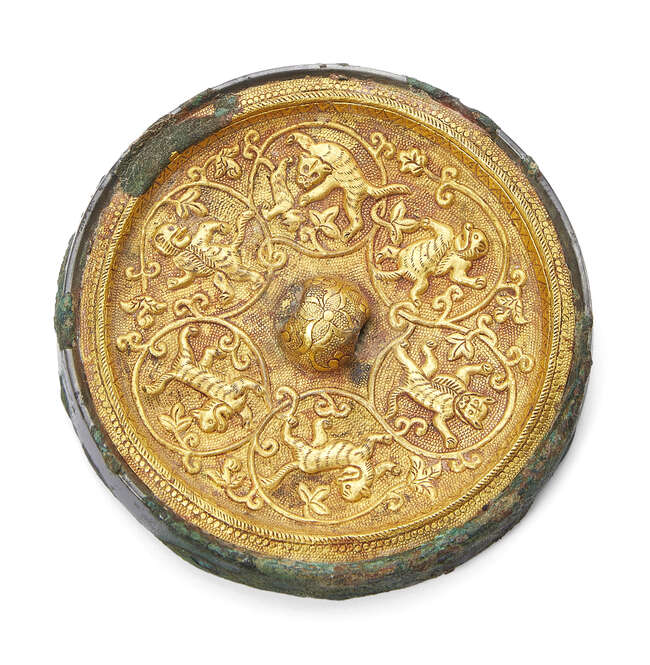 
	
		A rare Chinese bronze gold inlaid circular mirror, Tang dynasty, inlaid with a gold sheet...