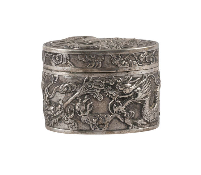 
	
		A Chinese export silver oval box, Chan Kong, early 20th century, repousse decorated to...