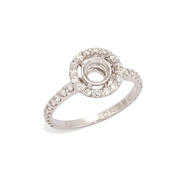 A diamond set ring mount with vacant central collet, the vacant, circular, four-claw collet...