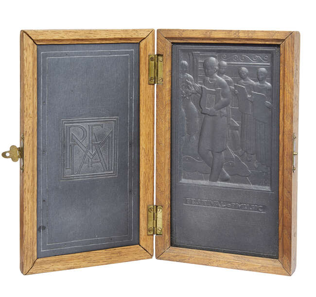 
	
		John McKenzie, 
		British 1897-1972- 
		 
		Festival of Music; 
		 
		carved slate...