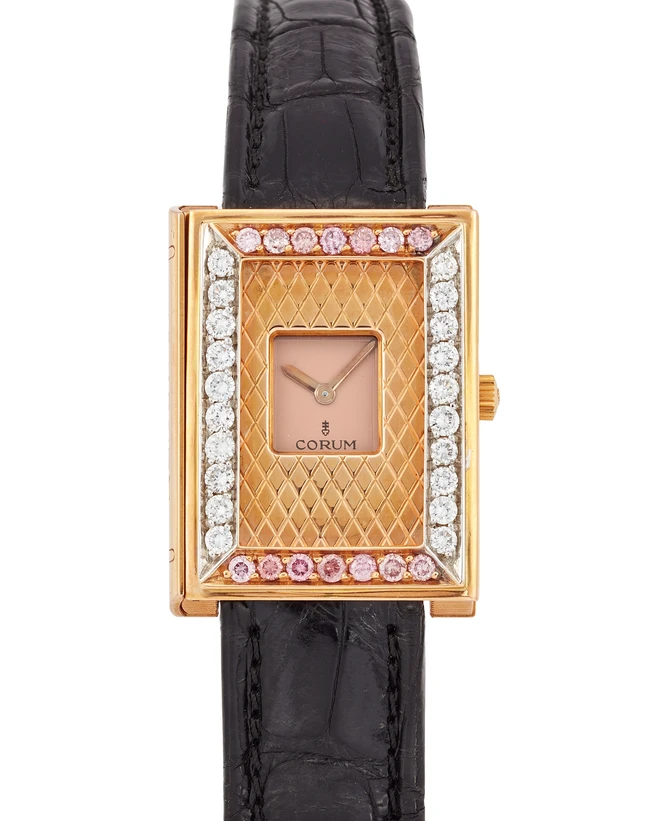 Corum. An 18ct gold diamond set wristwatch in the form of a bookGolden Book, Reference...