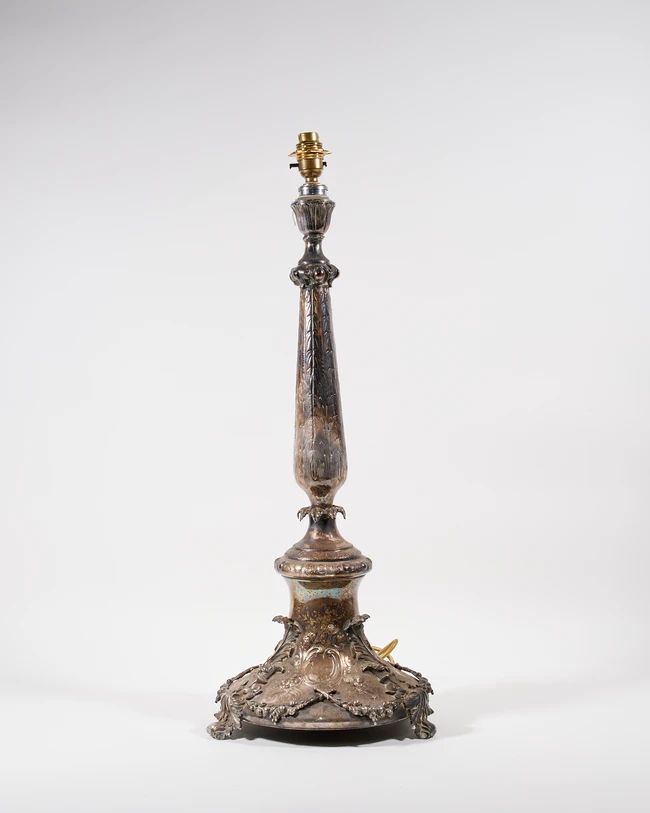 A large silver-plated table lamp, early 20th century, in the form of a candlestick, the foliate...