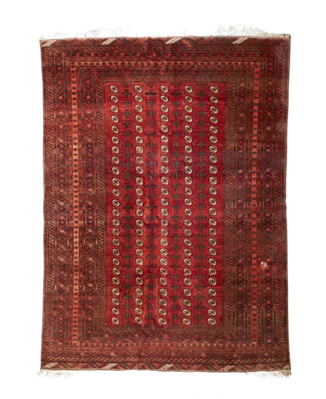 A Persian Bokhara carpet, third quarter 20th century, the central field with repeating gull...