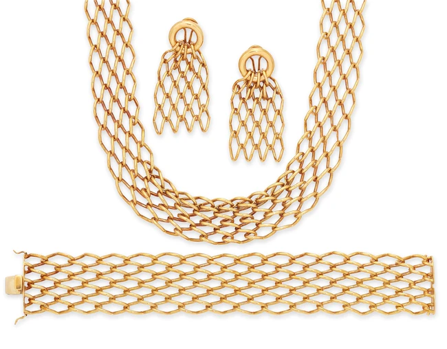 A necklace, bracelet and earrings set, each of multi-row wire panel design, the necklace stamped...